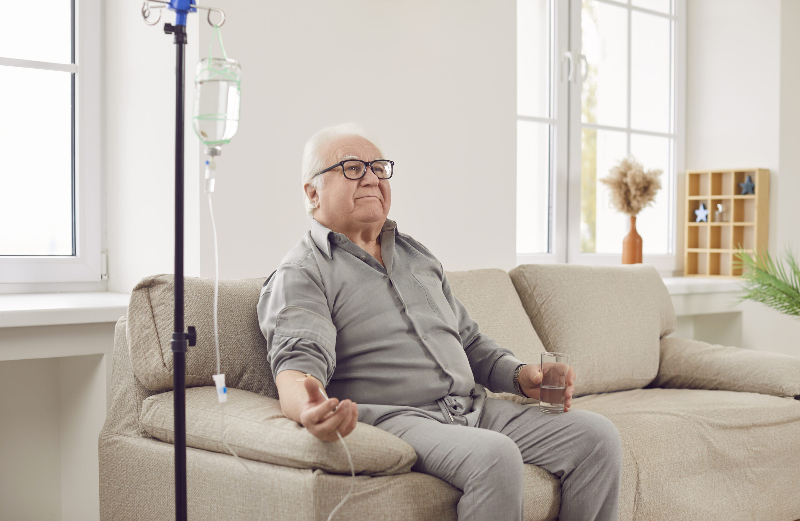 elderly man receiving IV therapy in skilled nursing facility in GreenAcres Place in Bossier City, LA
